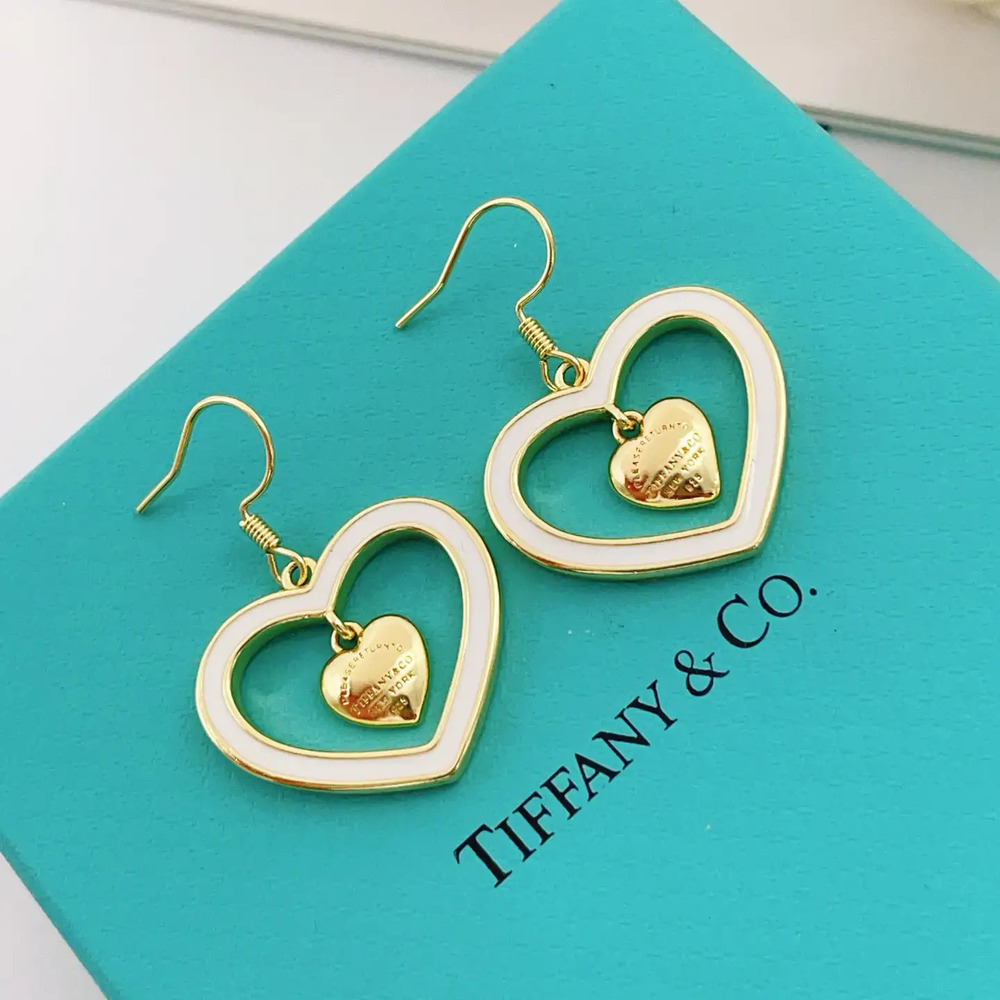 Tiffany & Co. Gold Tassel White Heart Earrings